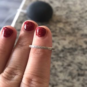 Diamond and white gold wedding band. Size 5.5.